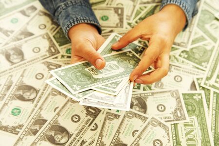 Woman hands holding paper money