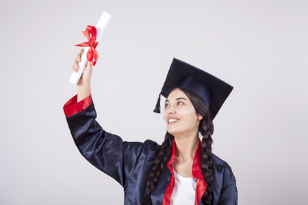 Portrait happy woman on her graduation day University. Education and peopleの写真素材