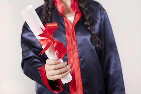 Portrait happy woman on her graduation day University. Education and peopleの写真素材