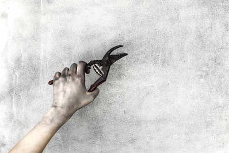 Top view retro working tools with hands on gray backgroundの写真素材