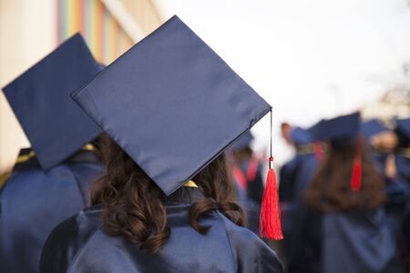 Group of Graduates during commencement. Concept education congratulation in University. Graduation...