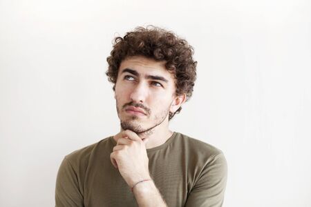 Young man thinking about things