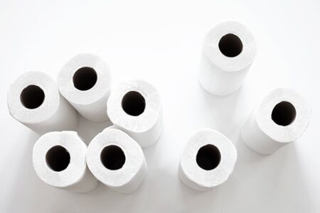Rolls of toilet paper isolated on whiteの写真素材