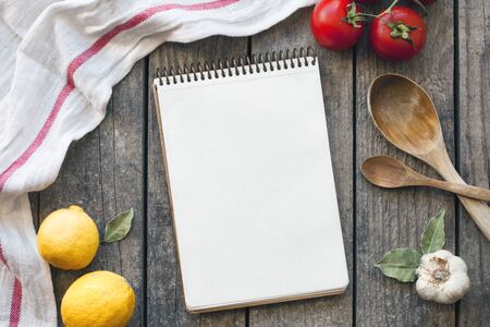 Blank recipe cooking book and utensils. Top view with copy spaceの写真素材
