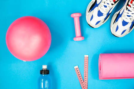 Sport equipment on blue background.の写真素材