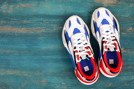 Sport equipment on wooden background.