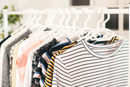 Clothing on hanger at the modern shop boutiqueの写真素材