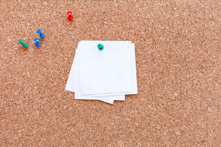 The cork board with blank notesの写真素材