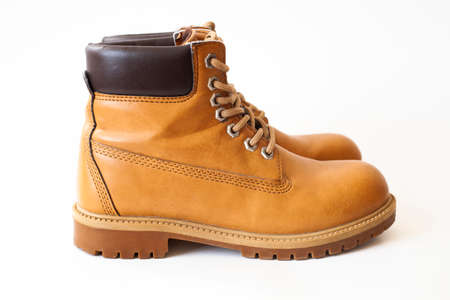 Light brown leather shoes on a white backgroundの写真素材