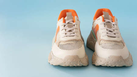 Colorful shoes on the blue backroundの写真素材