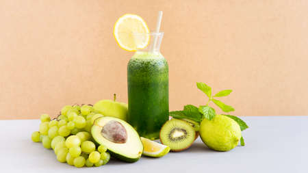 Detox Water Infused with Sliced Lemon, Cucumber and Sprigs of Mint. Copy Space on the Right.の写真素材