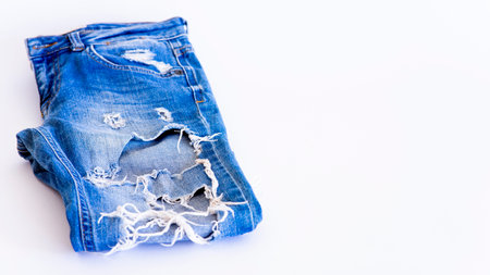 jeans on the background, blue and black jeans lie on a white background,の写真素材