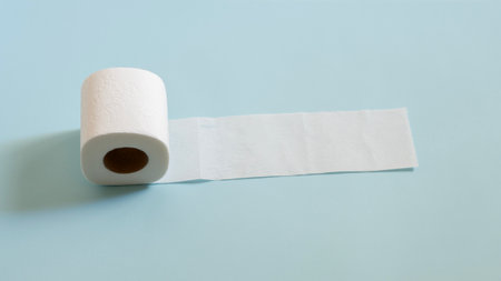 Top view of toilet paper roll on blue backgroundの写真素材