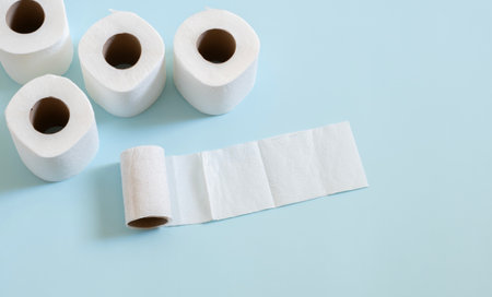 Top view of toilet paper roll on blue backgroundの写真素材