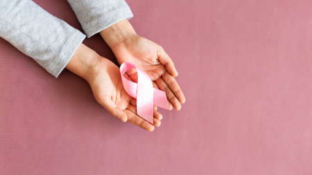Supporting Breast Cancer awareness concept. Pink ribbon symbol for breast cancer.の写真素材
