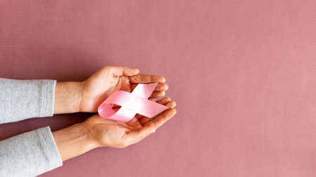 Supporting Breast Cancer awareness concept. Pink ribbon symbol for breast cancer.の写真素材