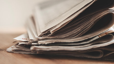 Different newspapers on the table