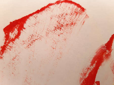 Red paint on white backgroundの写真素材