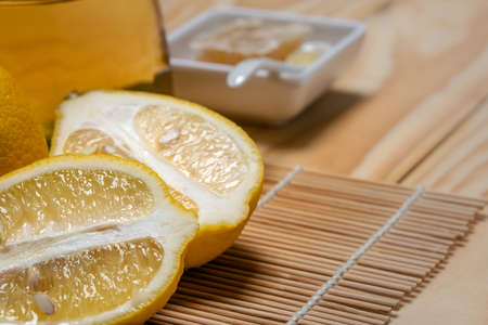 Fresh honey syrup mixed with fresh lemon juice  and hot water for drink .Healty food close-upの写真素材