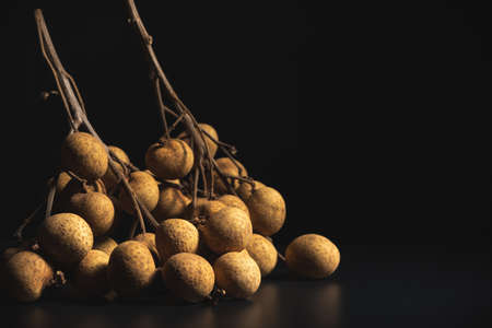 Close-up longan (Dimocarpus longan) isolated on black backdrop used for fruit background.Macroの写真素材