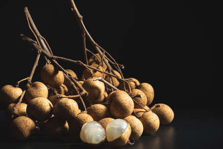Close-up longan (Dimocarpus longan) isolated on black backdrop used for fruit background.Macroの写真素材