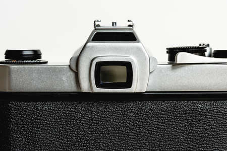 Back side of vintage film camera on white background,old viewfinder,vintage style,70'camera