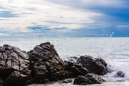 sea waves against rocks in the sea ,nature background,sea beachの写真素材