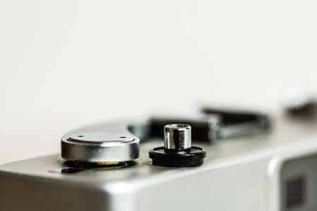 Close-up shutter button of film camera.button stainless,depth of field,vintage camera,has copy spaceの写真素材