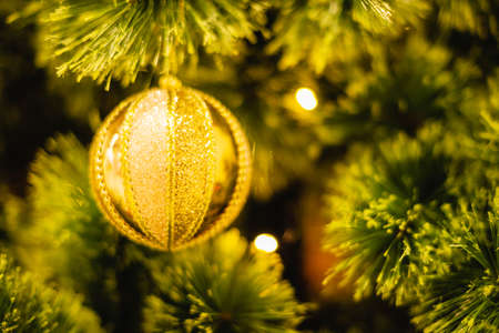 Close up of balls on christmas tree. Christmas tree and Christmas decorations. New Year concept.