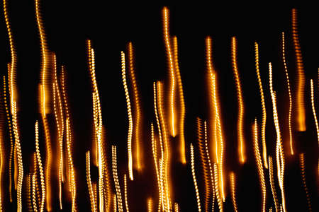 Abstract Bright Multicolored Glowing Lines and Curves on Black Background.の写真素材