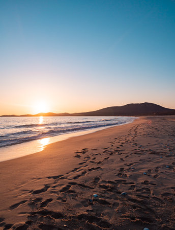 Sunset on the beach. Orange and golden sunset sky calmness tranquil relaxing sunlight summer mood.の写真素材