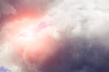 Heavy cloudy sky with sunlight