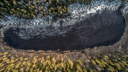 Aerial view of the great lake during spring day with snowの写真素材