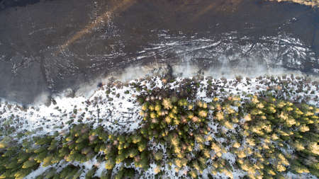 Aerial view of the great lake during spring day with snowの写真素材