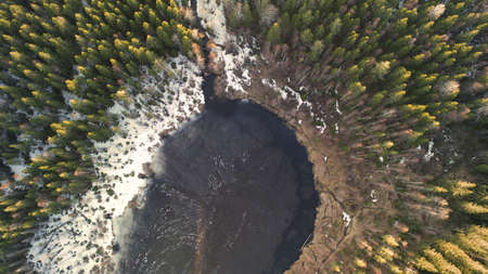 Aerial drone view of the great lake during spring day with snowの写真素材