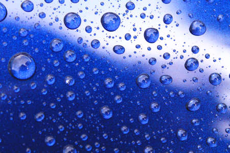 Close view on car body polished with water dropsの写真素材