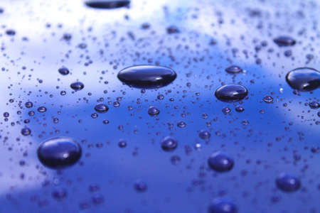 Close view on car body polished with water dropsの写真素材