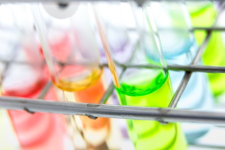 solution sample in glass tube in rackの写真素材