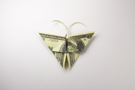 Origami butterfly made out of dollar billsの写真素材