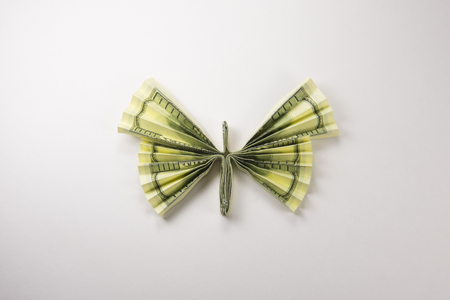 Origami butterfly made out of dollar billsの写真素材