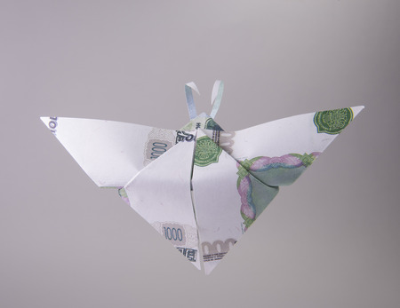 Origami butterfly made out of ruble billsの写真素材