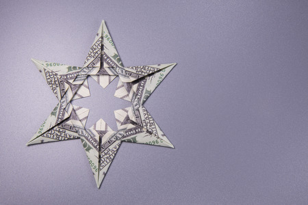 snowflake origami made of banknotes dollar Handmadeの写真素材