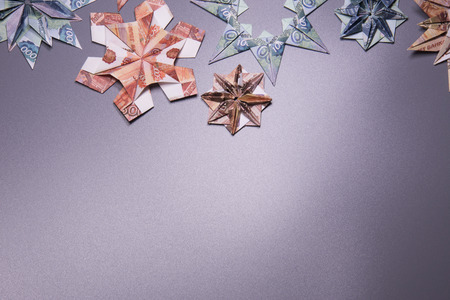 snowflake origami made of banknotes rubles. Handmadeの写真素材