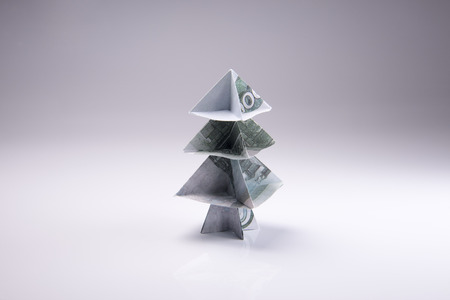 Christmas tree origami made of banknotes rubles. Handmadeの写真素材