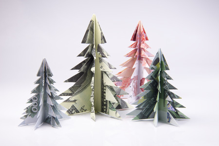 Christmas tree origami made of banknotes. Handmade