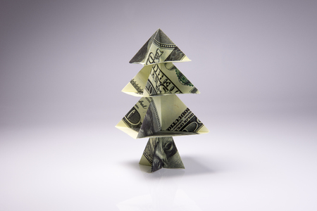Christmas tree origami made of banknotes dollar. Handmadeの写真素材