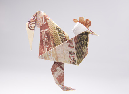 origami out of money in the form of a cockの写真素材