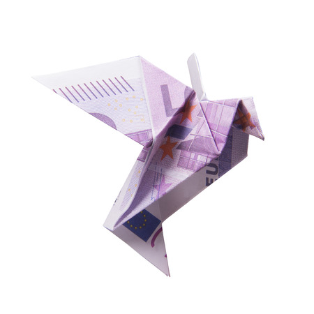 Origami Bird from banknotes on a white backgroundの写真素材