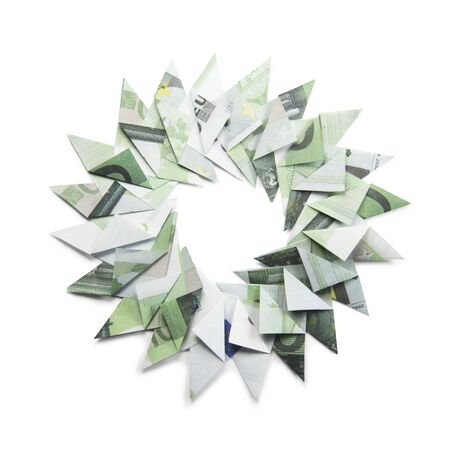 Christmas wreath origami banknotes on a white background. Handmadeの写真素材
