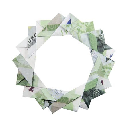 Christmas wreath origami banknotes on a white background. Handmadeの写真素材